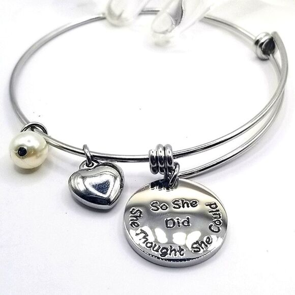 Silver toned ingraved Adustible charm bangle bracelet. - Picture 1 of 4